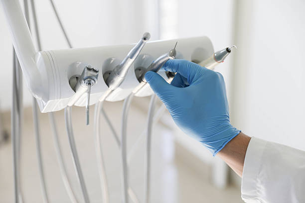 Professional Tooth Extraction technician working in Melody Hill, IN